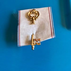 Gold key pin